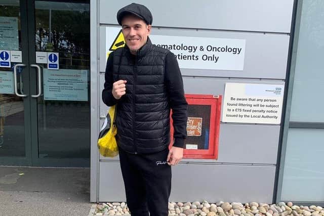 Josh Leigh outside hospital before his treatment.