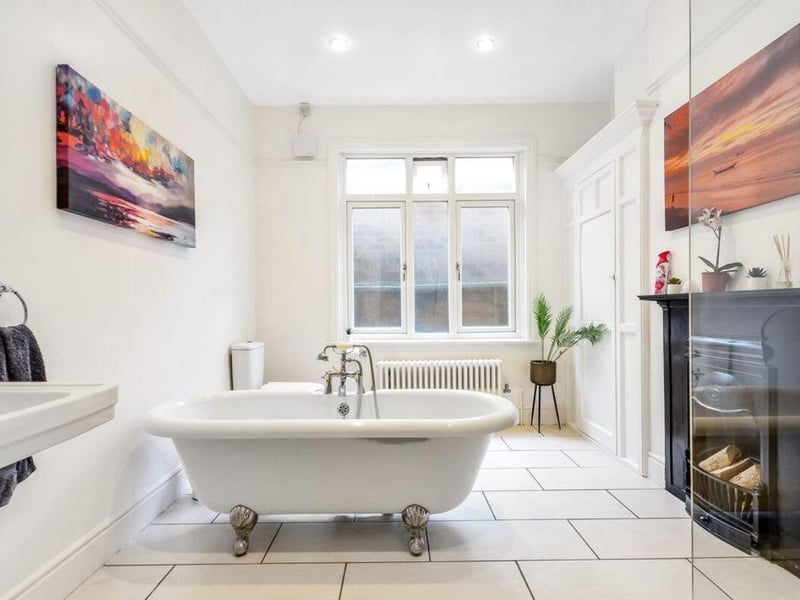 The listing says: "Set back from the road with car parking to the front, this symmetrical family home is ideally suited for the growing family, with versatile accommodation for an aging relative or those looking to entertain."