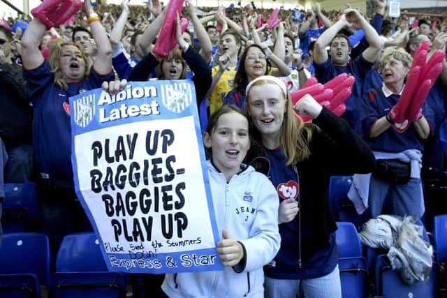 Pompey fans cheer on West Brom at the The Hawthorns. Picture: Nick Potts/PA.