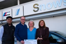 Richard Mead and his wife Ingrid are flanked by Tani Naduva, a Sales Executive at Snows BMW Portsmouth, and Diana Mackinnon, Head of Business, Snows BMW and MINI.
