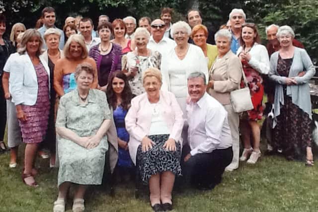 June Bettesworth at her surprise 80th party with family and friends 10 years ago.