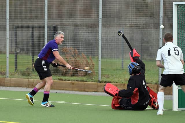 Not this time - hat-trick hero Stuart Avery sees this shot hit the Salisbury crossbar. Picture: Neil Marshall