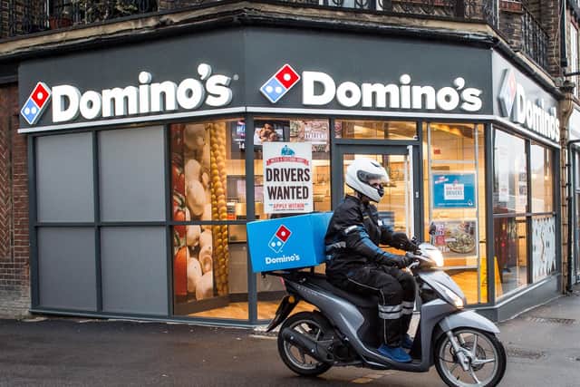 Domino's said it is looking to hire around 5,000 people as these temporary staff members call time on their lives as pizza chefs or delivery drivers. Photo: Domino's/PA Wire