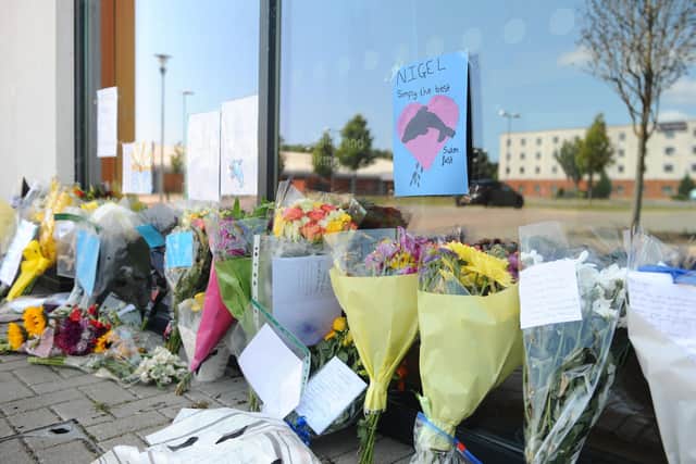 Flowers were laid outside Gosport Leisure Centre, on Monday, June 22, after the death of swimming coach Nigel Davis. Picture: Sarah Standing (220620-225)
