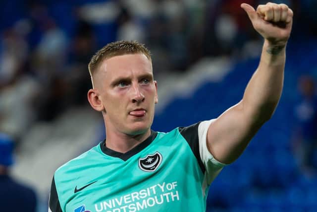 Ronan Curtis salutes fans after the final whistle at Cardiff