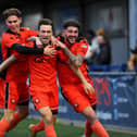 Portchester defender Conor Bailey, middle, celebrates his goal in Tuesday's thrilling draw withformer club Moneyfields.
Picture: Sarah Standing