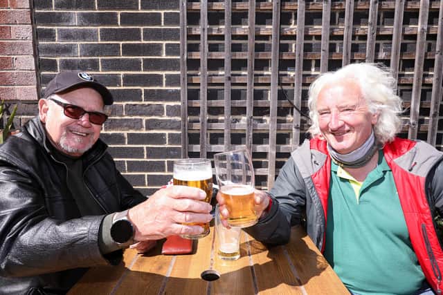 Ray Alford, left, and Phil Lymath. Drinkers enjoy the sunshine at the Parchment Makers, HavantPicture: Chris Moorhouse (jpns 240421-16)