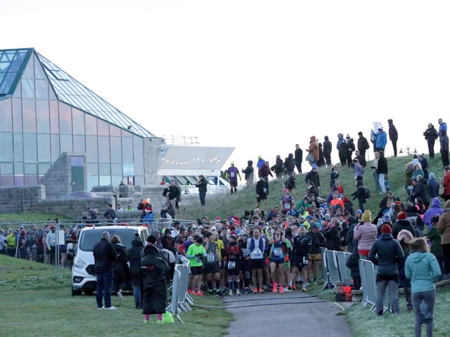 Runners wait for the start of the Portsmouth Coastal Waterside Marathon.