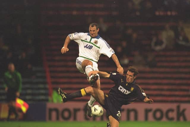Scott Green (white) in action for Wigan Athletic against Wimbledon in 2000. Green has now taken up a full time role at Gosport Borough. Pic: Aubrey Washington/Allsport.