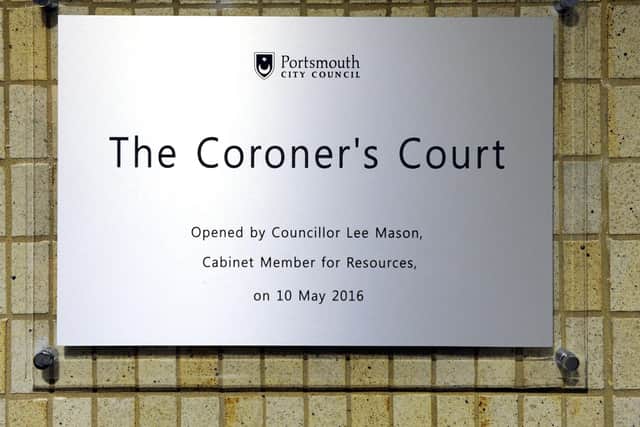 The Coroner's Court in Guildhall Square, Portsmouth, Hampshire 

Picture by:  Malcolm Wells (180405-3355)