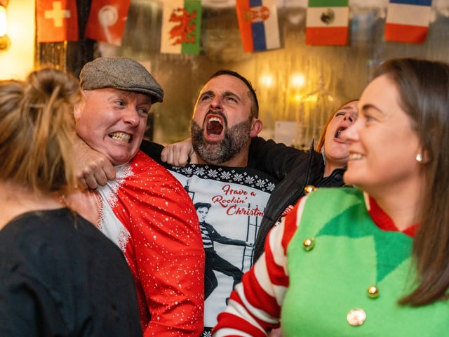England fans celebrating Harry Kane's penalty at The Kings in Southsea. Picture: Matthew Clark