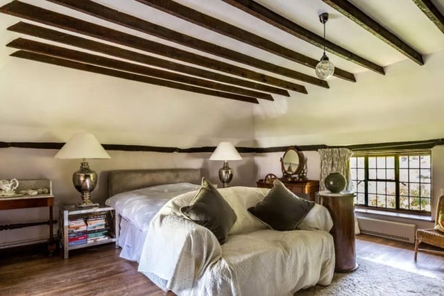 The listing says: "Enjoying established secluded gardens, a delightful Grade II listed country cottage featuring a host of period features and offering adaptable accommodation that includes an annexe."