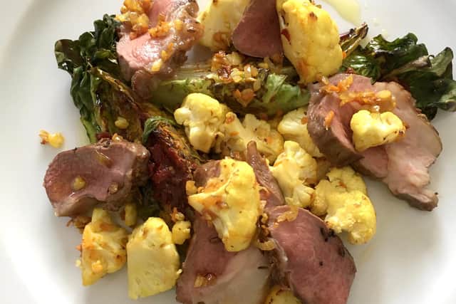 Barbecue lamb with baby gem and cauliflower by Lawrence Murphy.
