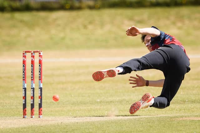 A Havant player throws at the stumps.
Picture: Keith Woodland
