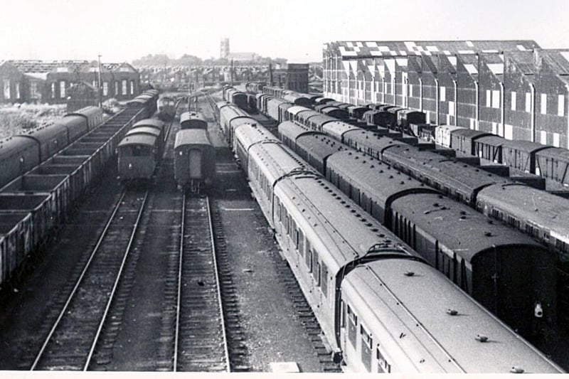 Trains galore pictured in Fratton Yard, viewed from the office of the adjoining Goods Depot offices in Goldsmith Avenue in 1967. The carriages of a  4 COR Portsmouth electric can be seen to the right along with coal wagons, brake vans and assorted other stock. The former Loco shed can be seen roofless to the top left.