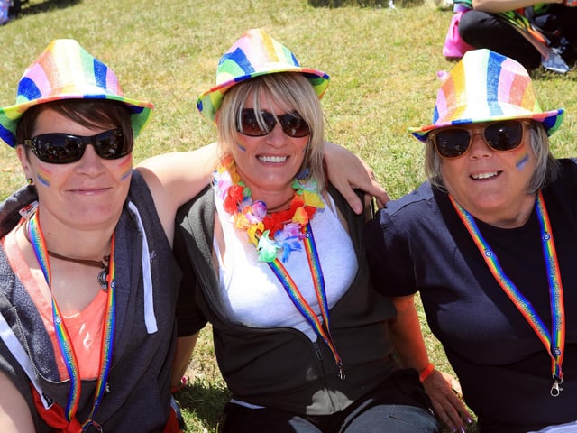 From left, Rachel Spindlow, Dawn Lee and Sian Wiltshire. Portsmouth Pride, Southsea Common. Picture: Chris Moorhouse (jpns 110622-17)