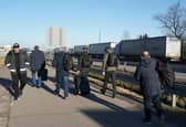 Ukrainian men make their way back to their homes at the Dorohusk border crossing between Poland and Ukraine Picture: Janek Skarzynski/AFP via Getty Images