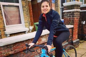 Cllr Charlotte Gerada on a bicycle.