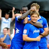 Goalscorers Izale McLeod and Ashley Harris celebrate during Pompey's 3-0 victory at Crawley in September 2012. Picture: Allan Hutchings