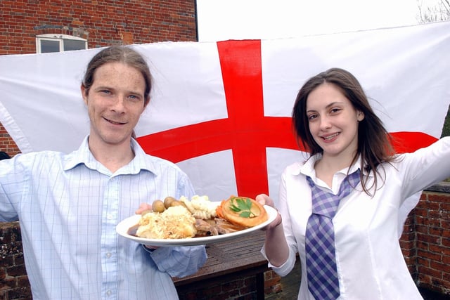 Deputy manager Thomas Lowe and waitress Phillipa Cox celebrate St George's Day (061743-35)