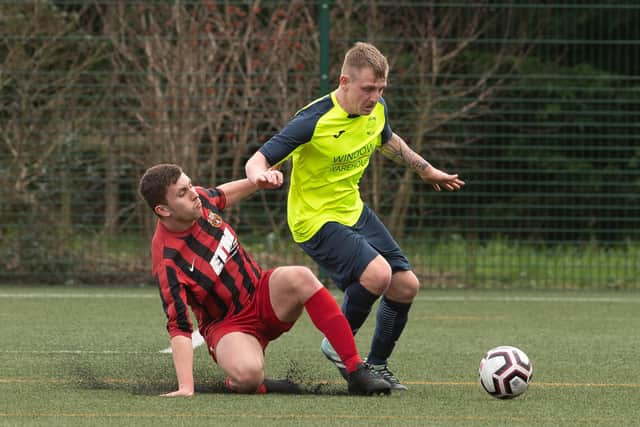 Action from Harvest Home's 6-0 win over Horndean. Picture: Keith Woodland