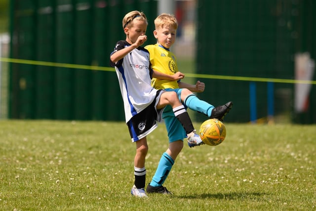 Action from the Clanfield youth football tournament at Horndean Technology College. Picture: Keith Woodland (270521-617)