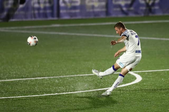 Jake McCarthy adds another one to his list of Hawks goals scored from outside the 18-yard box. Picture by Dave Haines.
