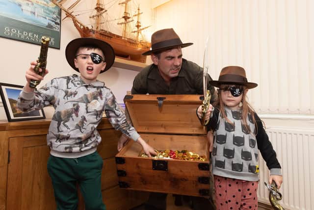 Pictured is: Kai, Kyle and Bonnie Parks with their treasure Picture: Keith Woodland (021021-12)