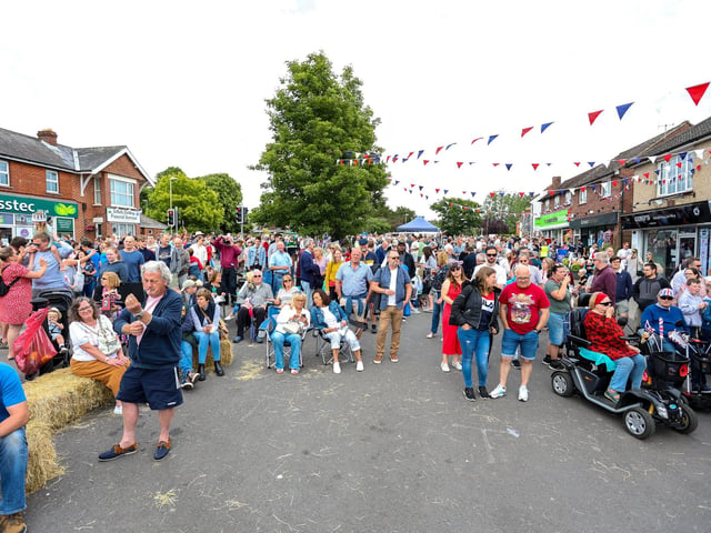 Hundreds of people filled Denmead's shopping area which was closed for live music, dancers and magicians