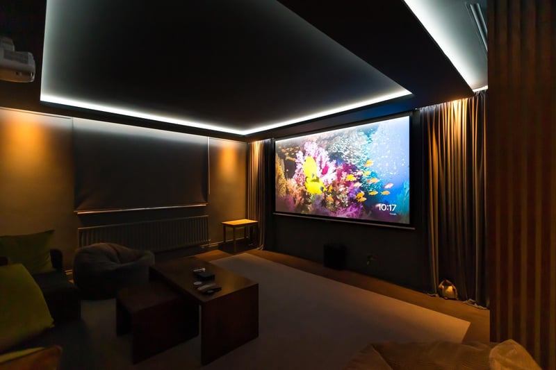 One of the bedrooms has been converted into a cinema room.