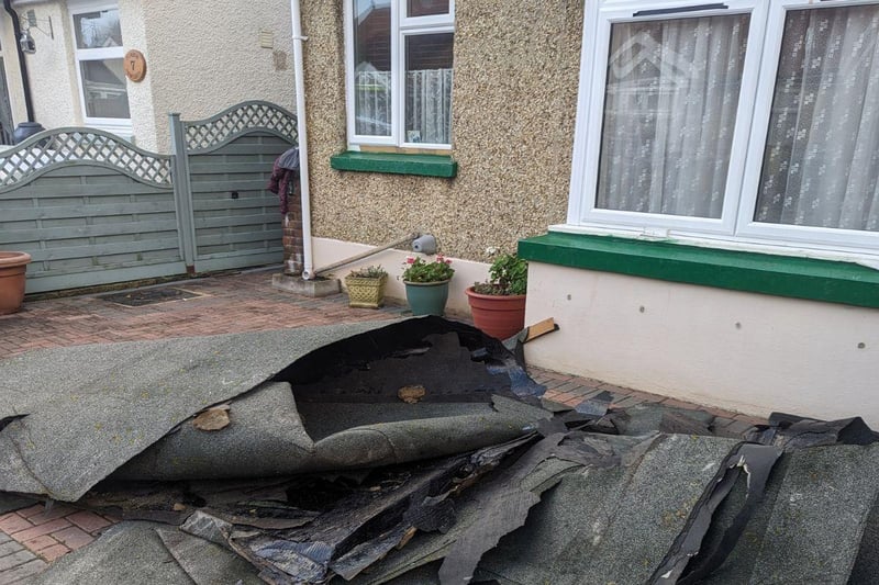 This felt was blown into the front yard of this Gosport bungalow, damaging the property.