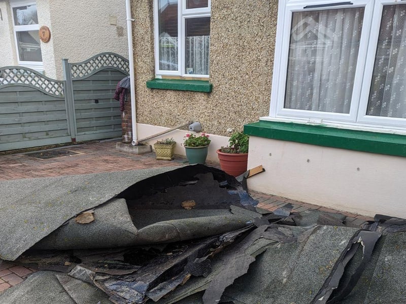 This felt was blown into the front yard of this Gosport bungalow, damaging the property.
