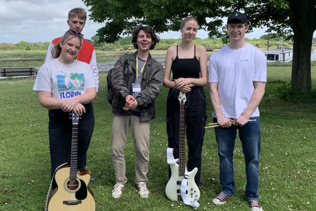 Musician Jack Flanagan with music students at St Vincent Sixth Form College