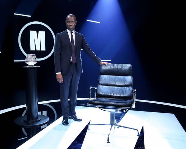 Clive Myrie with Mastermind's black chair