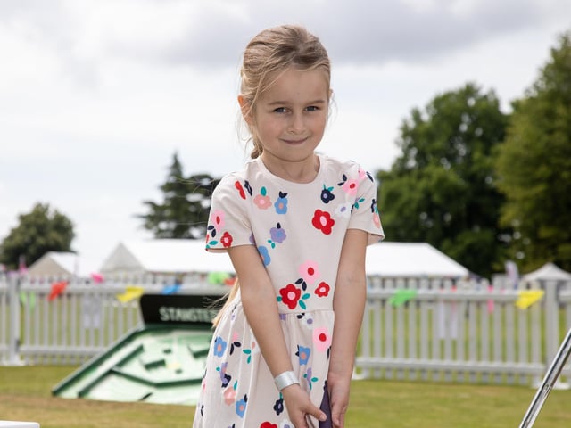 Stansted Park opened its doors for its Summer Festival this weekend, with re-enactments, vintage vehicles, archery, horse displays and lots of fun for the family.Pictured - Maya Hutt, 5 enjoying the mini golfPhotos by Alex Shute