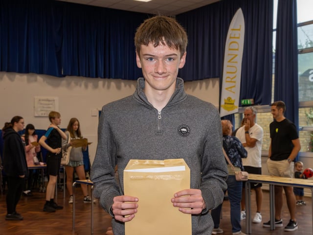 Students were welcomed to Crookhorn College to collect their GCSE results.Pictured - Joseph in Year 10 receiving his Geography results Photos by Alex Shute