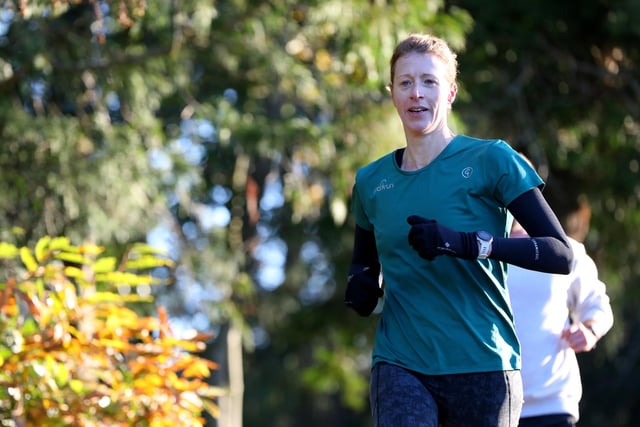 Jo Stanford leads the way as the first woman to finish Havant parkrun at Staunton Country Park