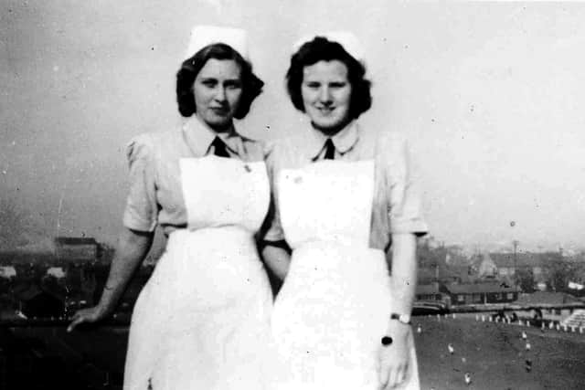 Trainee nurses Shelia Alexander, left, and Mary Phelan on the roof of the former Royal Hospital in Commercial Road.
