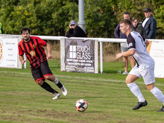 Fleetlands (red/black) v Bemerton. Picture by Mike Cooter