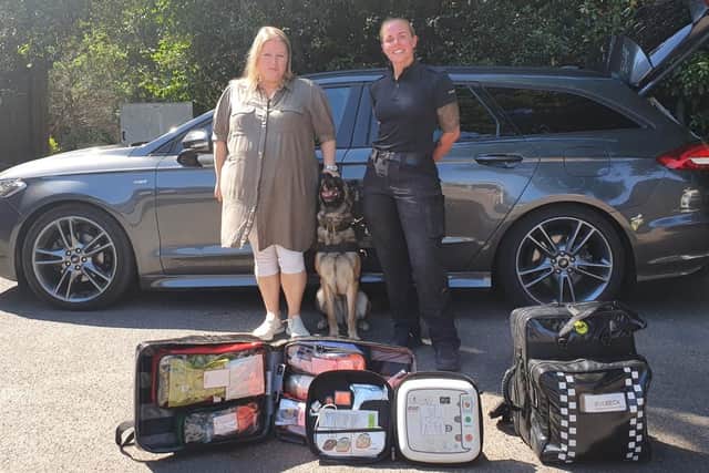 Hampshire police and crime commissioner Donna Jones, left, with a police dog unit and some of the new first aid and trauma kits bought for dog handler across Hampshire and Thames Valley