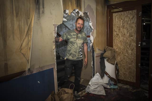My Dog Sighs at the doorway he first found partially blocked up in the former casino building. Picture: Mike Cooter