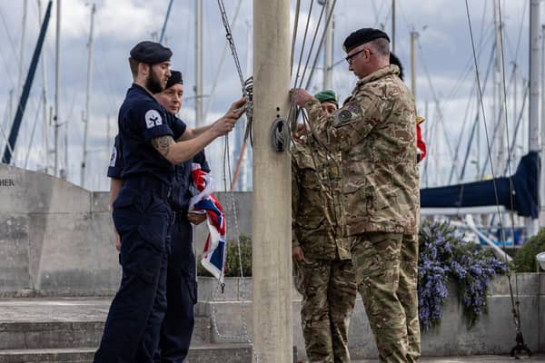 The moment the Royal Navy flag was lowered and the British Army flag raised at today's ceremony to mark the transferring of command of the Joint Services Adventure Sail Training Centre in Gosport
Photographer: Corporal Rob Kane