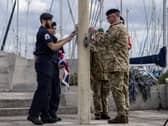 The moment the Royal Navy flag was lowered and the British Army flag raised at today's ceremony to mark the transferring of command of the Joint Services Adventure Sail Training Centre in Gosport
Photographer: Corporal Rob Kane
