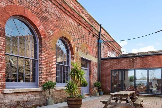This two-bedroom detached house, situated in a Grade II listed building, is on the market at a guide price of £1,250,000. It is listed by Taylor Hill & Bond, Titchfield.