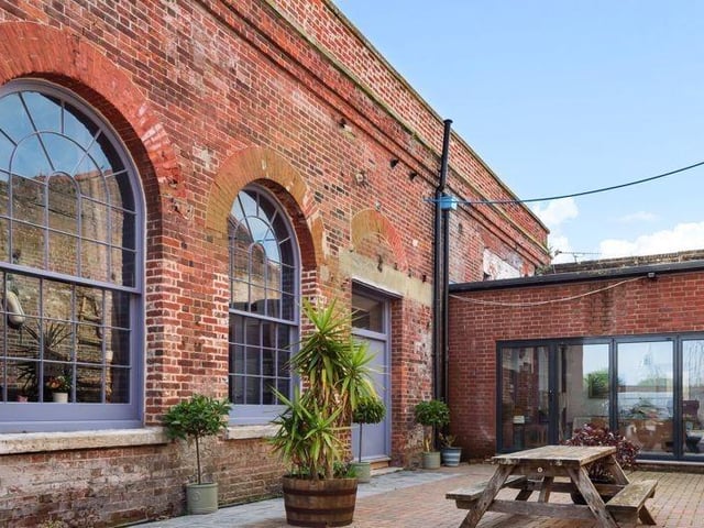 This two-bedroom detached house, situated in a Grade II listed building, is on the market at a guide price of £1,250,000. It is listed by Taylor Hill & Bond, Titchfield.