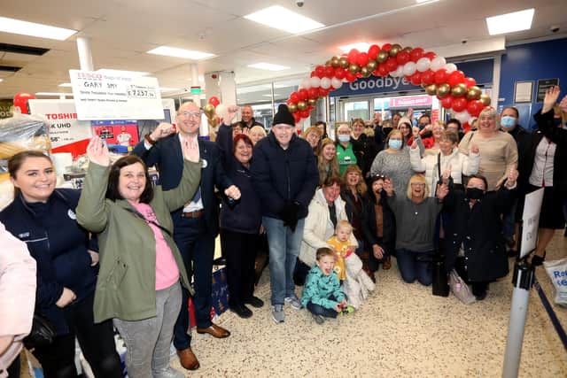 Gary Smy is welcomed back by colleagues and customers. Picture: Sam Stephenson