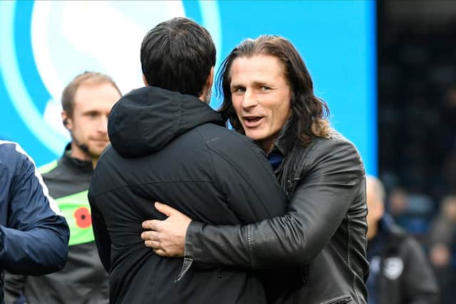Wycombe boss Gareth Ainsworth congratulates Danny Cowley following Pompey's win at Adams Park back in November.