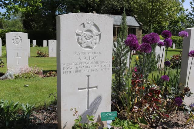 The Commonwealth War Graves Commission is preparing virtual tributes for those who fell during the Second World War. Here, a tribute is placed at the grave of Flying Officer S.A. Hay. Picture: CWGC