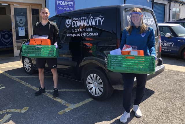 Pompey first team player Ben Close with Katie Aris delivering food parcels