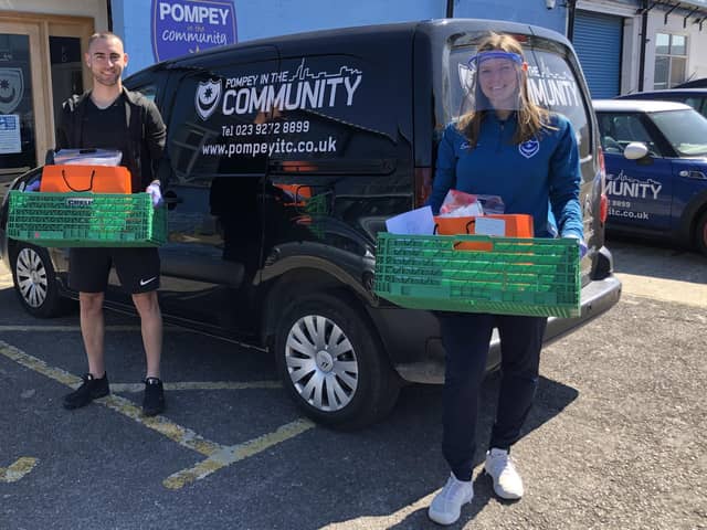 Pompey first team player Ben Close with Katie Aris delivering food parcels